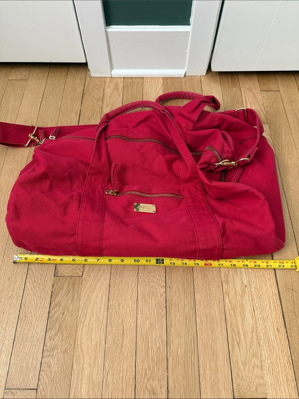 L.L. Bean Red Duffel Bag with Gold Hardware